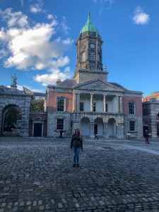 Woman in Ireland standing in front of building