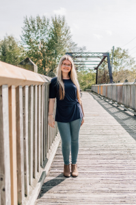 Katelyn standing on bridge