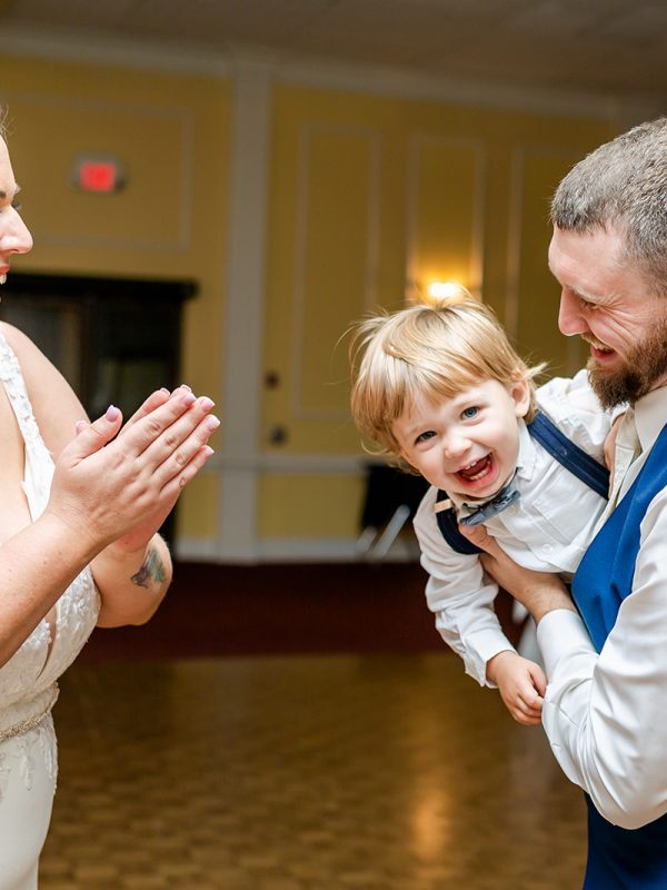 Bride and Groom dancing with their son